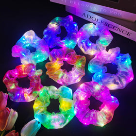asawira front packaging showing eight glow scrunchies and benefits