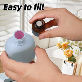 ASEVAT bottle being squeezed to show smooth controlled dispensing