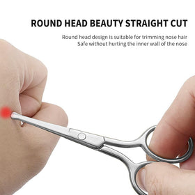 AsonTao scissors held in hand demonstrating portable size and control