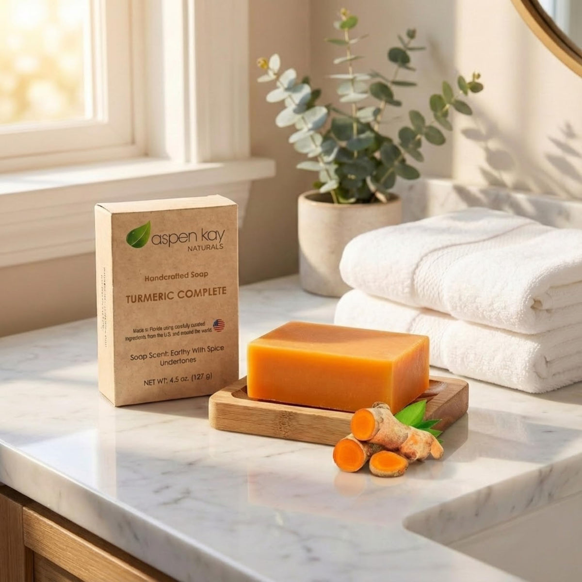 Aspen Kay Naturals bar on draining soap dish showing size and lasting use