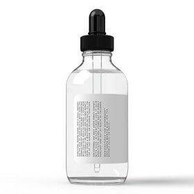 Asterwood serum on bathroom shelf suggesting daily routine use