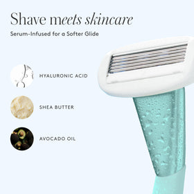 Athena Club razor held to show scale and weighted handle for better control