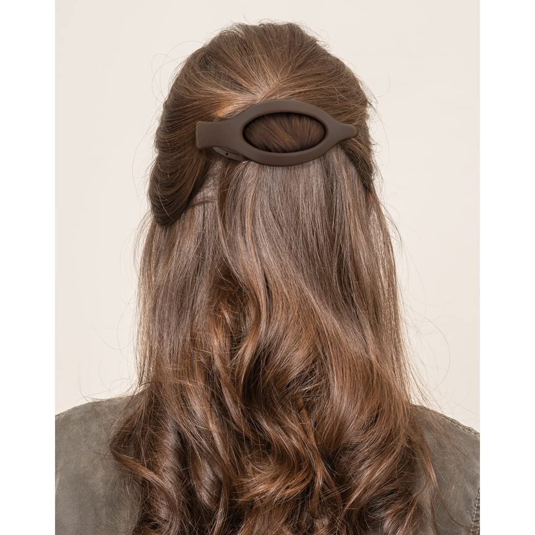 ATODEN clip holding a half-up hairstyle showing reliable grip benefit