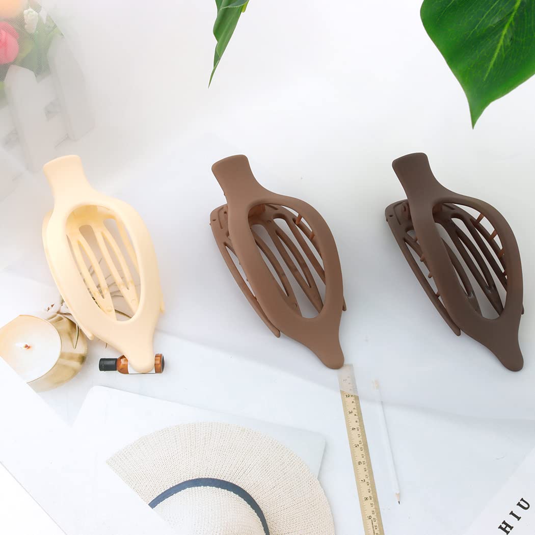 ATODEN clip worn with beach outfit showing all-day secure styling benefit
