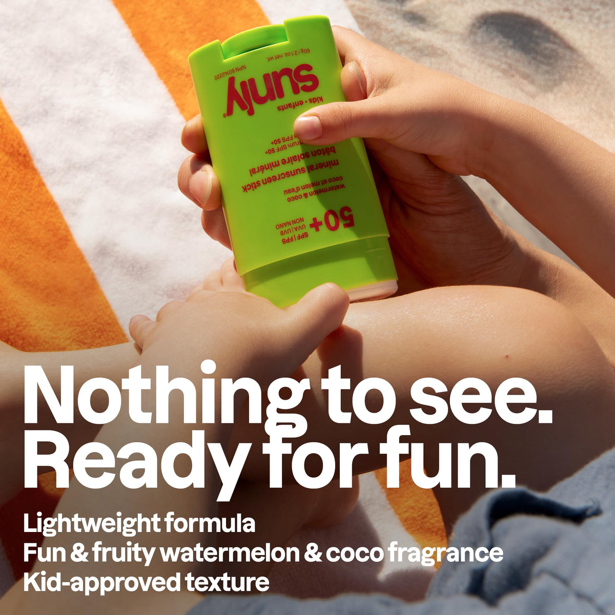 ATTITUDE applying sunscreen stick to child cheek for quick, targeted protection
