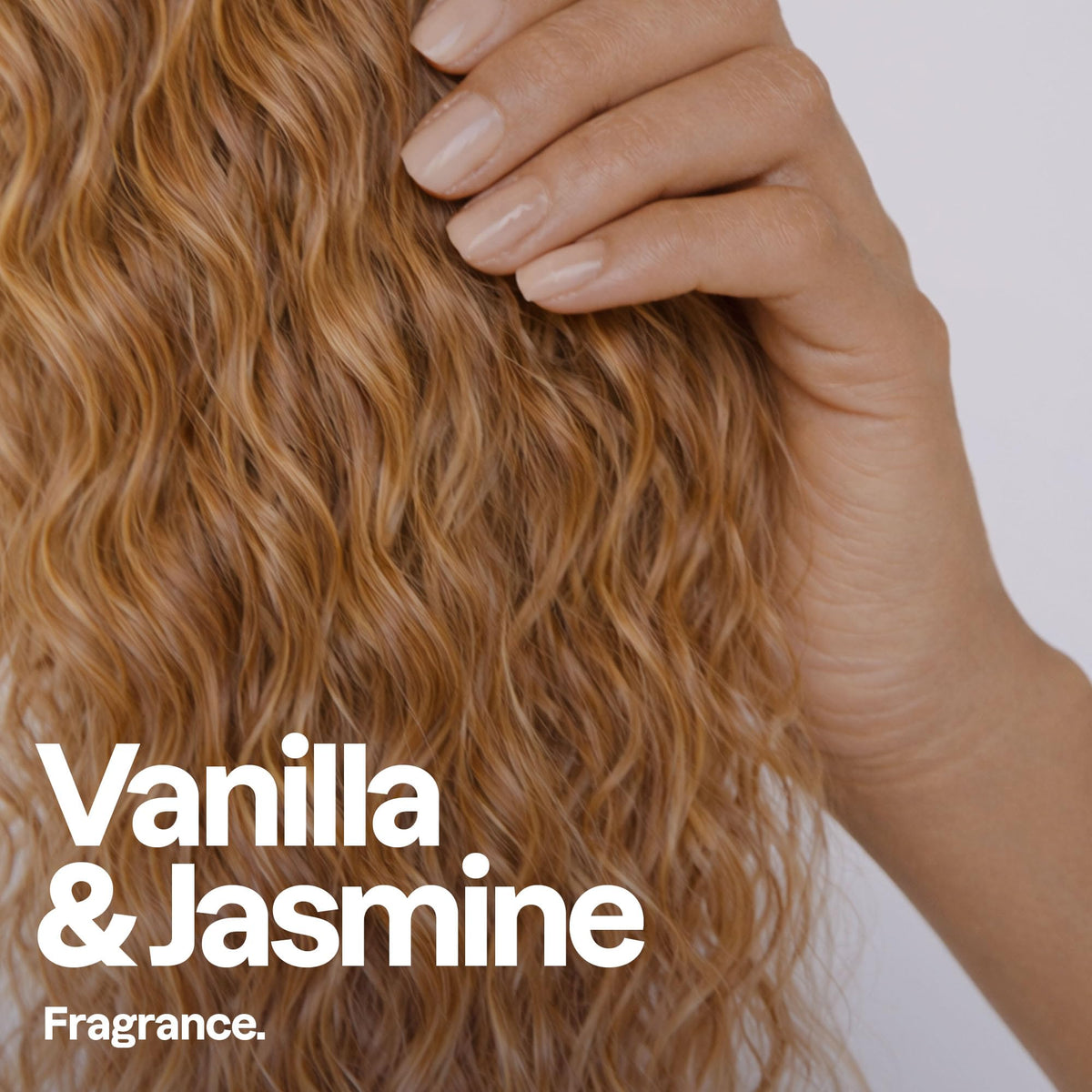 ATTITUDE applying conditioner to wet curls demonstrating detangling and softness