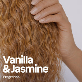 ATTITUDE applying conditioner to wet curls demonstrating detangling and softness