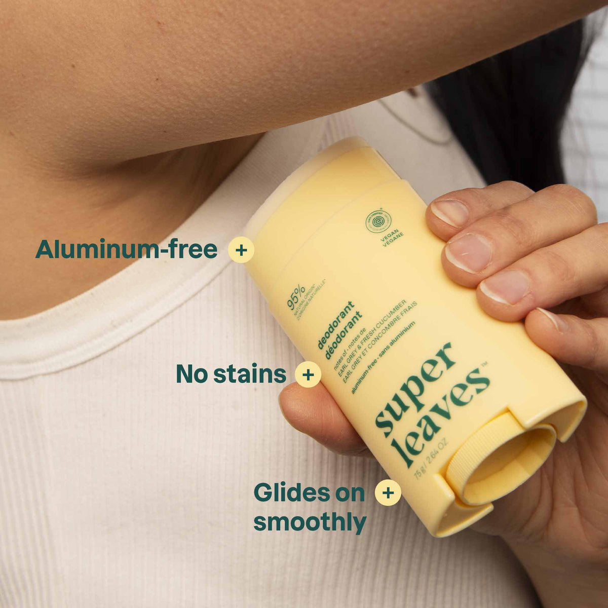 ATTITUDE held in hand for scale, illustrates compact travel-friendly size