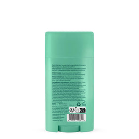 ATTITUDE deodorant beside a hand for scale, indicates compact 2.64 oz size and portability