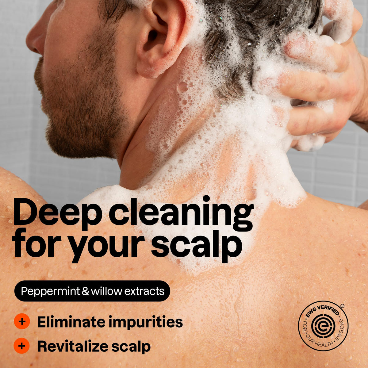 ATTITUDE in-shower use showing product lathering on men's hair for convenience