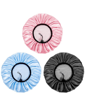 Auban shower cap next to common objects showing extra-large size