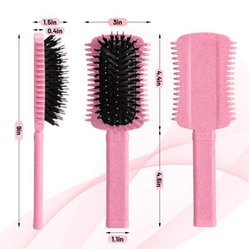 Auhrjomra brush held in hand to show size and ergonomic grip
