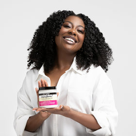 Aunt Jackie's before-and-after image illustrating reduced tangles and smoother, softer hair