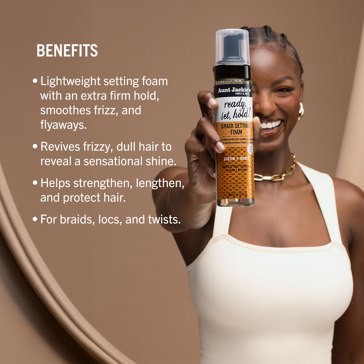 Aunt Jackie's foam applied to braids to smooth frizz and set styles