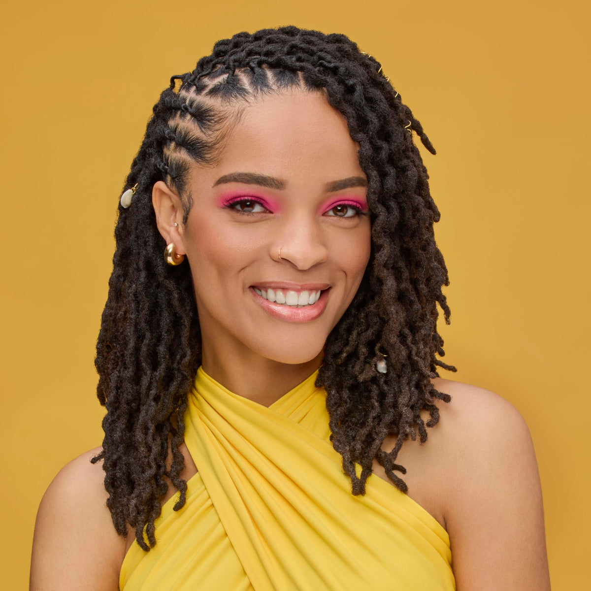 Aunt Jackie's before-and-after braids refreshed without frizzing