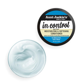 Aunt Jackie's conditioner being applied to hair showing easier detangling