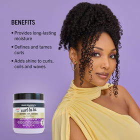 Application on wet curls using Aunt Jackie's custard to enhance curl formation and manage frizz