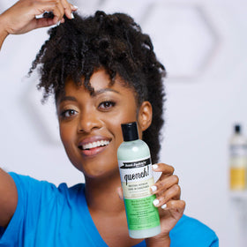Aunt Jackie's product dispensed into hand illustrating detangling slip and reduced knotting