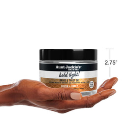 Aunt Jackie's label close-up featuring biotin and honey benefits for strength
