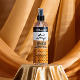 Aunt Jackie's label close-up highlighting biotin and honey ingredients