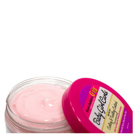 Aunt Jackie's custard texture on fingers demonstrating smooth slip and soft finish