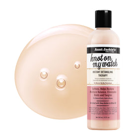 Close-up of product mist on strands highlighting silky slip and smooth texture benefit
