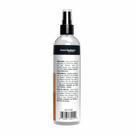 Applying Aunt Jackie's to scalp to soothe and invigorate the scalp