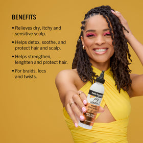 Aunt Jackie's spray pump texture close-up for precise scalp targeting