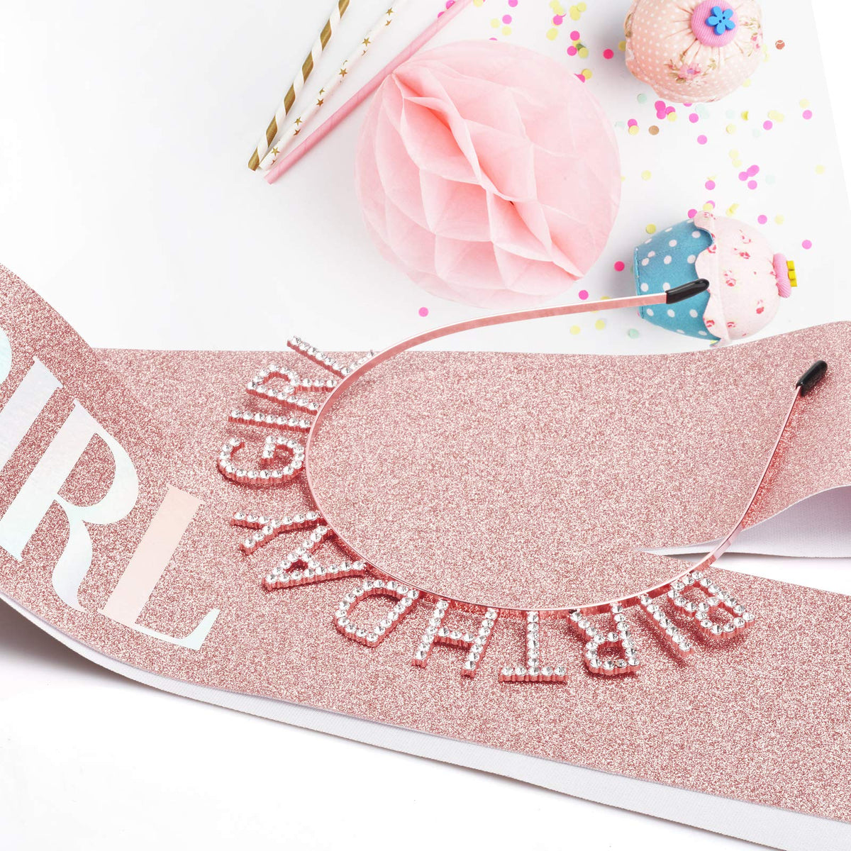 Aurmigle sash and tiara styled on party table creating celebratory, Instagram-ready vibe