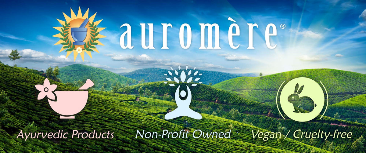 Auromere bar shown in hand for scale and travel-friendly convenience