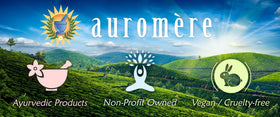 Auromere bar shown in hand for scale and travel-friendly convenience