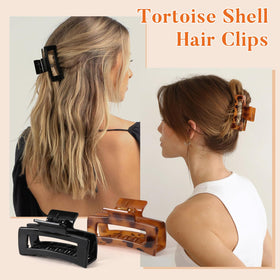 Auseibeely clips held in hand to show scale and comfortable lightweight size