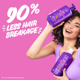 Aussie conditioner being applied in shower for improved detangling