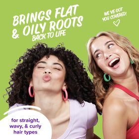 Model spraying Aussie on roots to refresh hair, demonstrating quick oil absorption and volume benefit