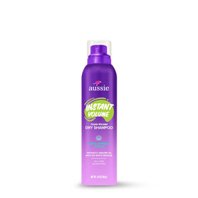 Mint leaves and waterlily blooms next to Aussie can illustrating the fresh scent benefit