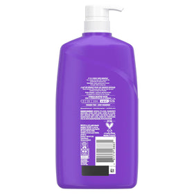 Aussie bottle staged in bathroom setting, suggesting everyday curl care routine convenience
