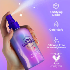 Aussie applied to damp hair detangling and priming for styling
