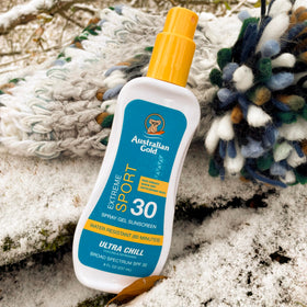 Australian Gold label close-up highlighting botanicals and oxybenzone-free claim
