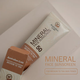 Australian Gold ingredients label close-up showing mineral and botanical actives