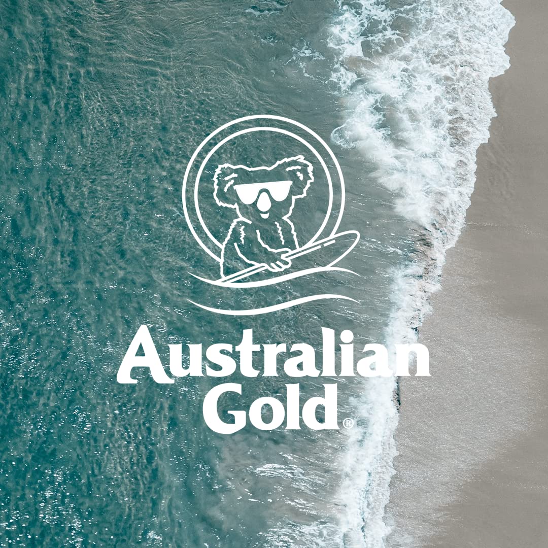 Australian Gold bottle on beach towel illustrating water-resistant protection