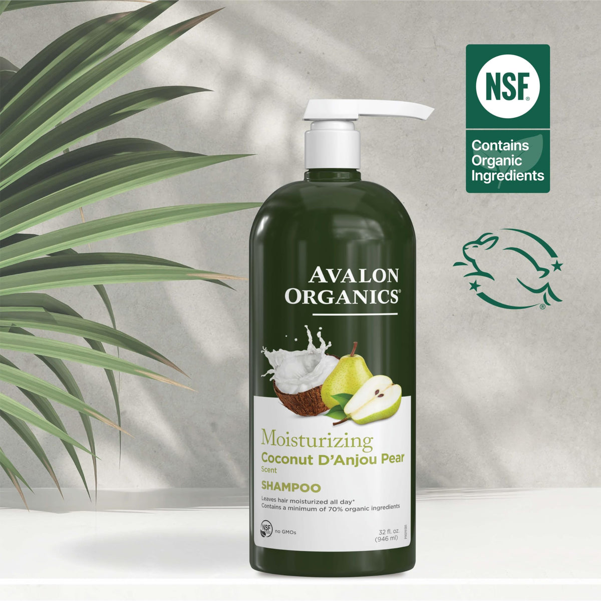 Avalon Organics bottle scale comparison next to hand to show the 32 fl oz volume benefit