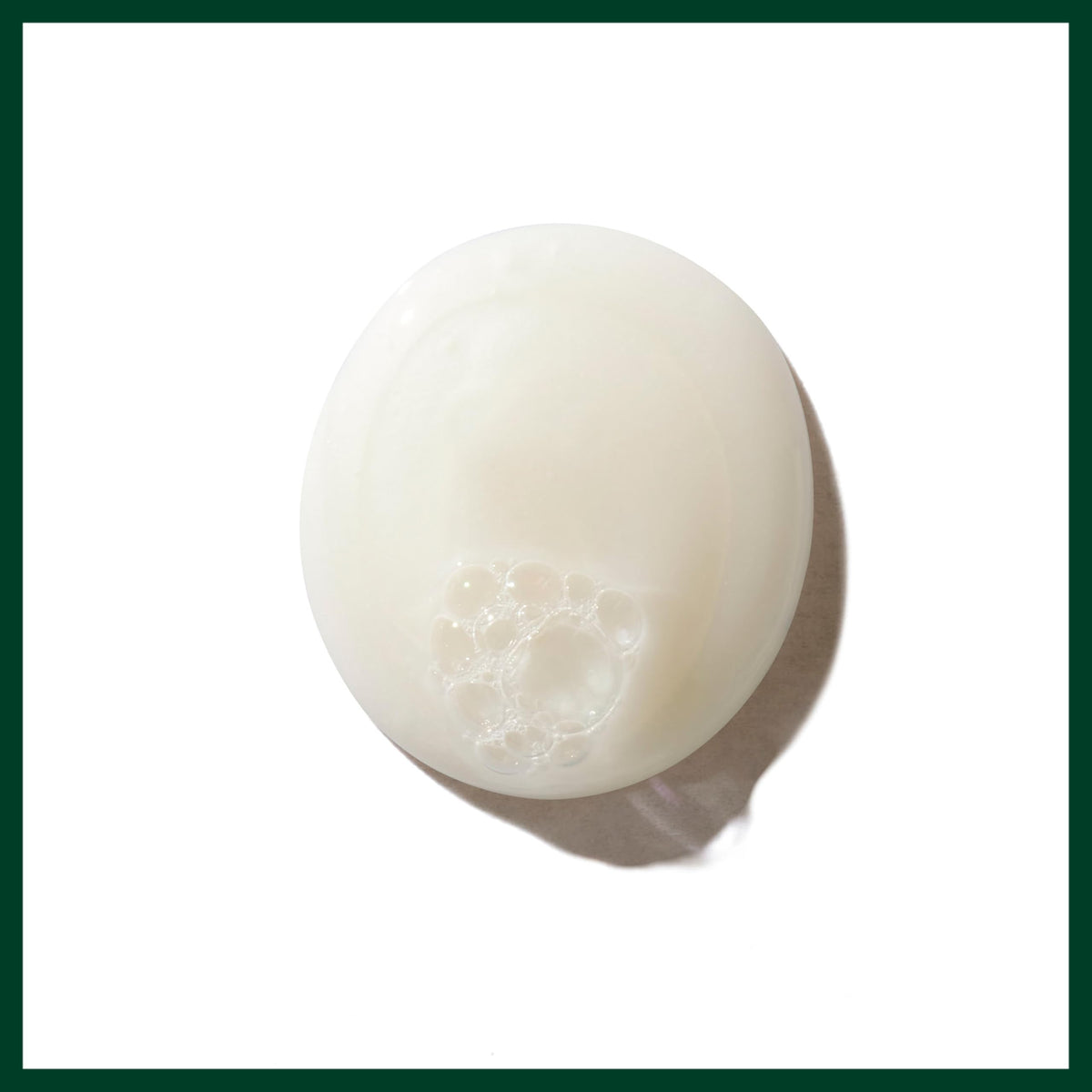 Aveda be curly held in hand to show 8.5 oz scale and travel-friendly convenience benefit