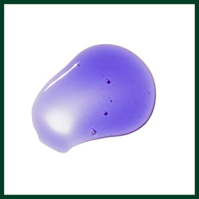 Aveda Blue Malva shampoo lathering in hand during use illustrating gentle cleansing benefit