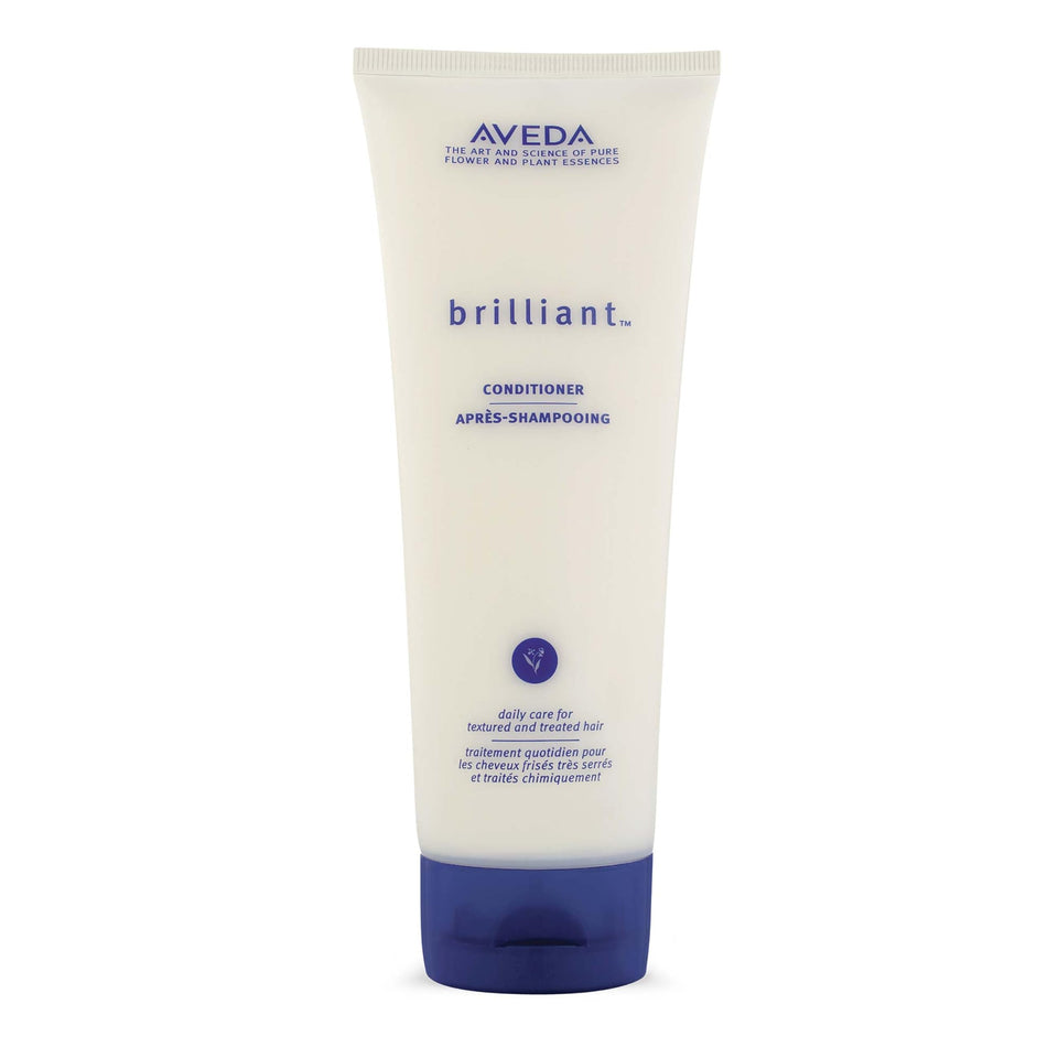 Aveda Brilliant front bottle showing label and elegant packaging benefits visible branding