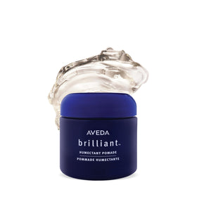 Aveda Brilliant pomade jar front view showing branding and compact size, enhances styling
