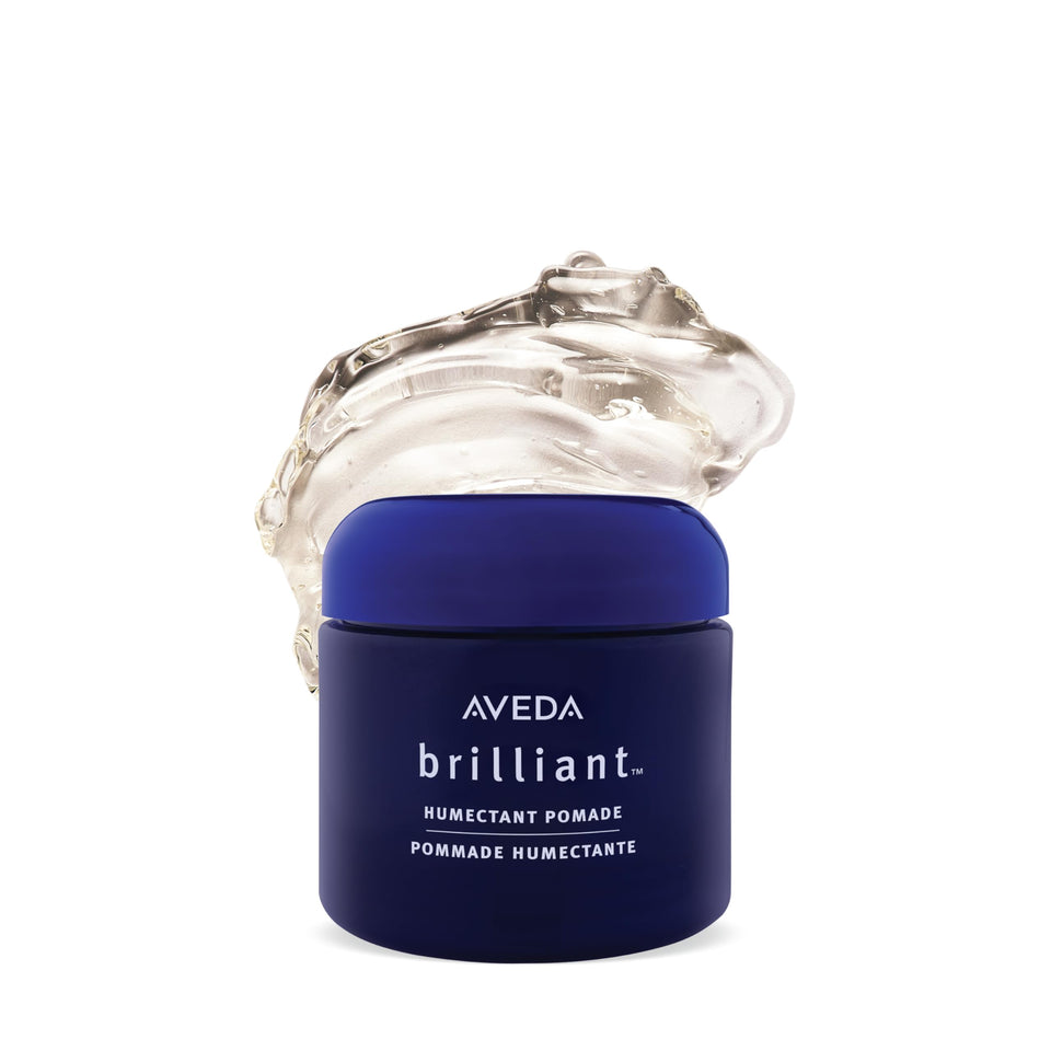 Aveda Brilliant pomade jar front view showing branding and compact size, enhances styling