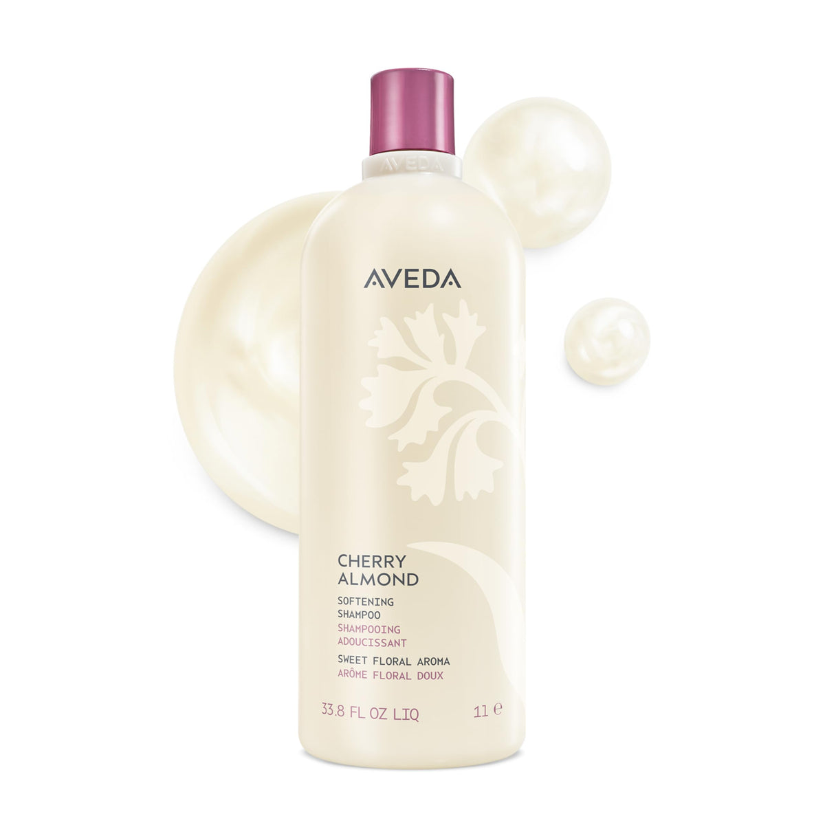 Aveda Cherry Almond front bottle showing product and volume, promotes soft hair