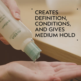 close-up of Aveda Confixor gel texture highlighting lightweight spreadability and sheen