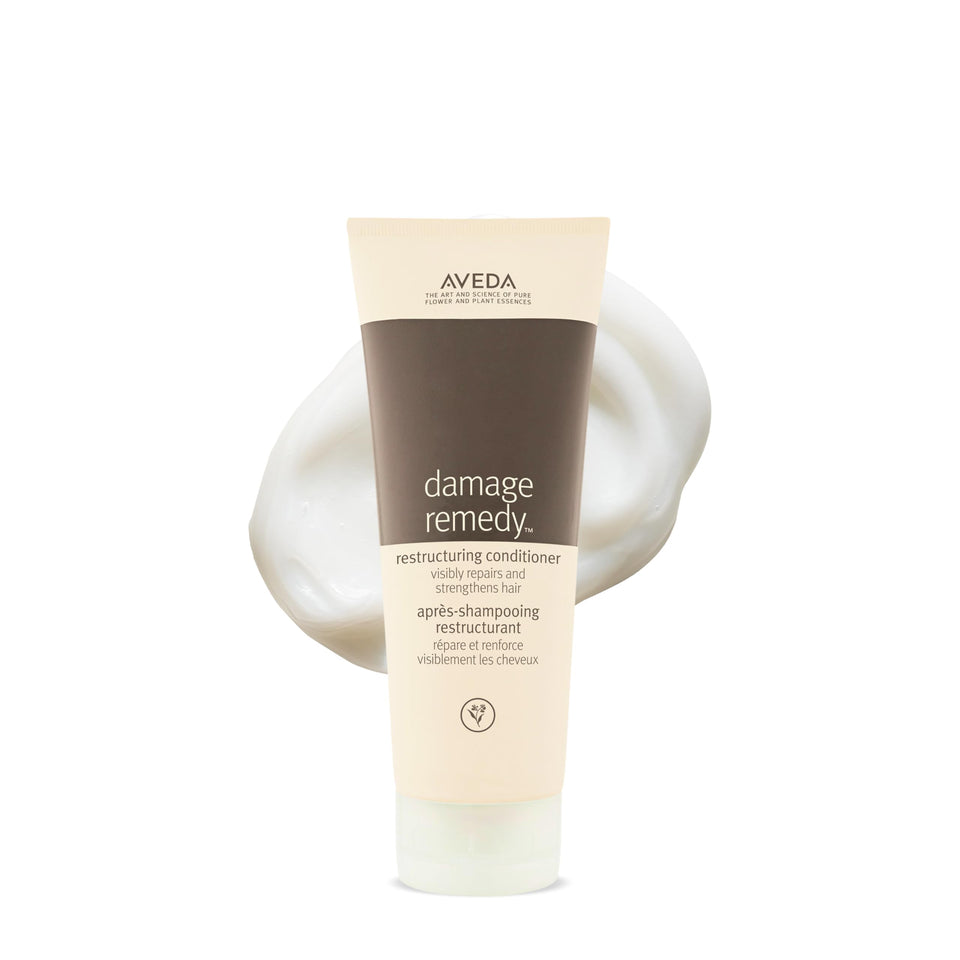 Aveda bottle front view showing label and clean design for visible repair benefits