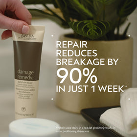 Aveda Damage Remedy creamy texture close-up highlighting smooth spreadability